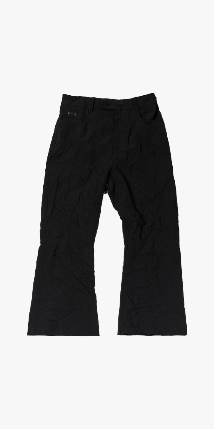 Cutting wrinkled-effect pants